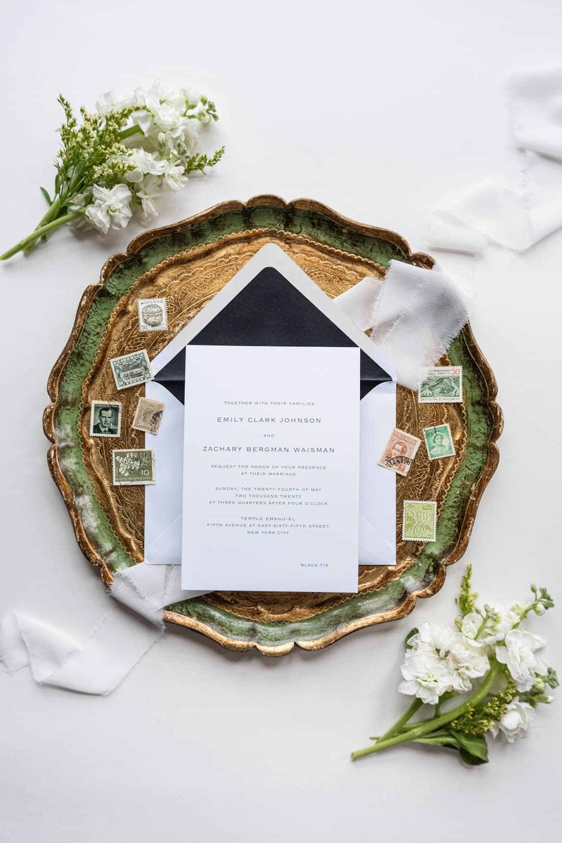 Wedding invitation and florals